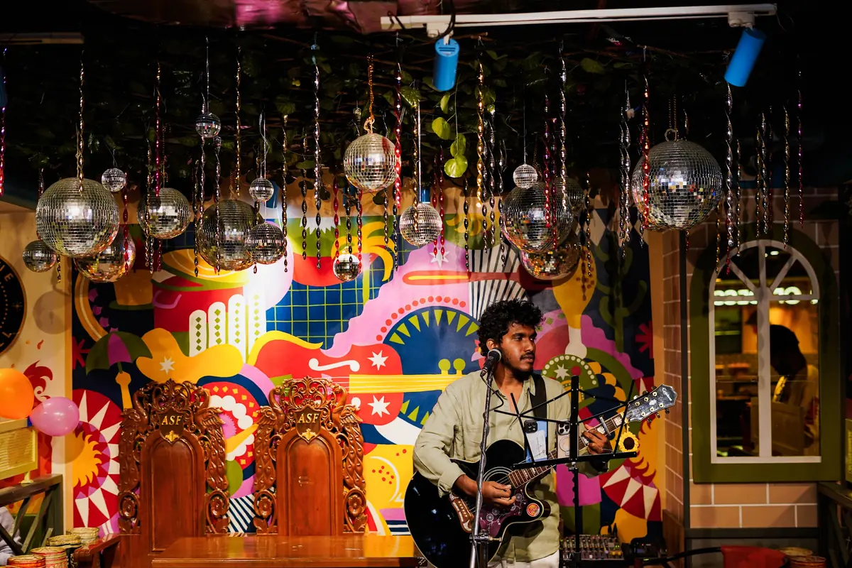 A singer performing live at ASF